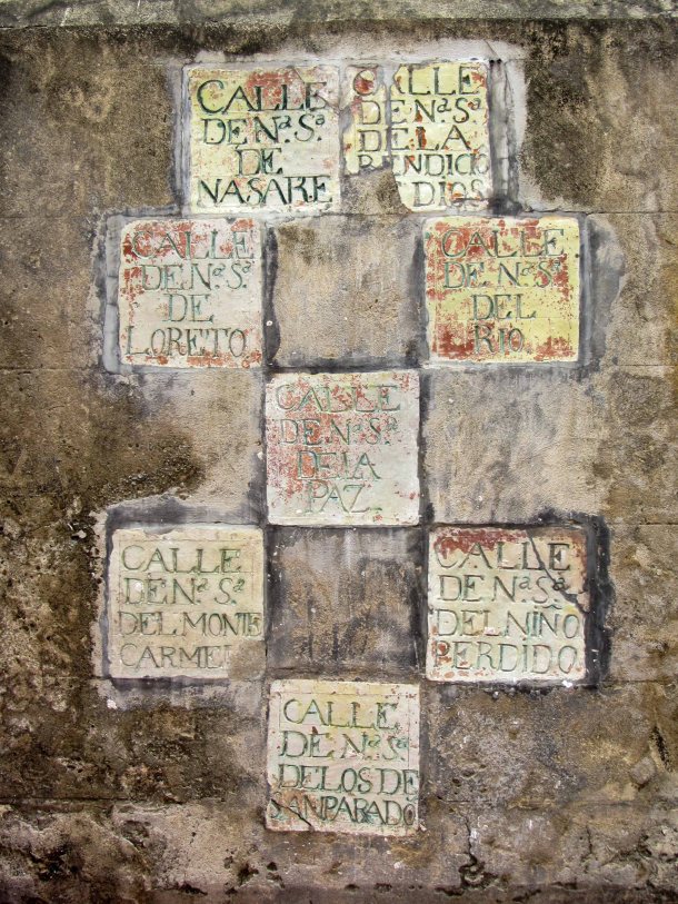 Old stone street signs in Cartagena, Colombia